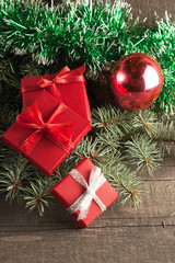 Luxury New Year gifts, different present boxes under Christmas tree in holiday eve, Christmastime celebration, home decorated with festive shiny balls, magic night