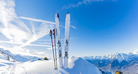 Ski in winter season, mountains and ski touring equipments on th - obrazy, fototapety, plakaty