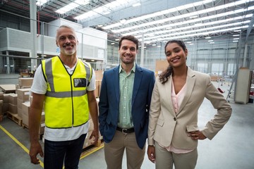 Portrait of warehouse team standing together