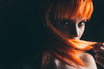 Young red hair woman portrait