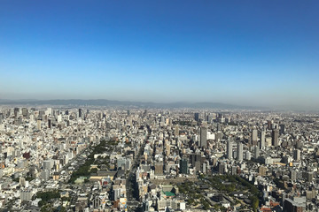Fototapeta premium OSAKA JAPAN - 15 OCTOBER, 2016: Osaka city view from Abeno Harukas building in Tennoji. Abeno Harukas is a multi-purpose commercial facility and is the tallest building in Japan.