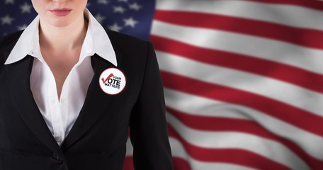Composite image of stylish redhead businesswoman in suit