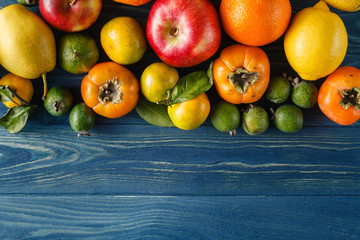 Include fresh organic vegetables on white wooden floor with copy