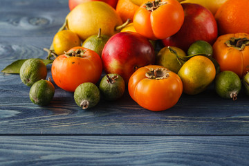 Assorted pile of different colorful fake fruits and vegetables