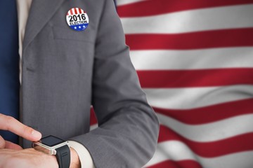Composite image of businessman looking at watch