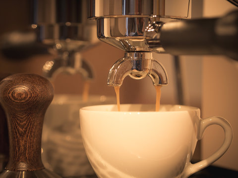 photo shows espresso brewing, a nice crema for a perfect espresso shot