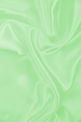 Smooth elegant golden silk as wedding background. In Sepia toned