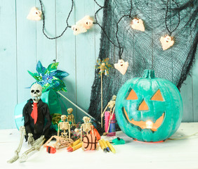 Teal Jack O Lantern  symbolizing non food treats for Halloween