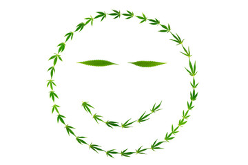 Smiling face with gooks made of hemp leaves