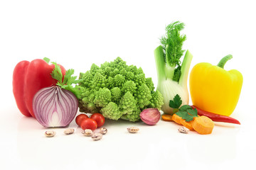 Organic vegetables and fruits in wicker basket isolated