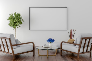 Two Chairs with blank picture frame on the wall