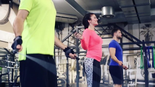 Group rope skipping in functional training gym as fitness exercise
