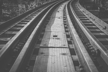 Railroad track curve around a bend in thailand