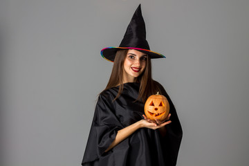 cheerful woman in halloween style clothes