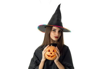 beauty young brunette girl in halloween style clothes