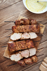 Skewered meat or shish kebabs of pork in marinade