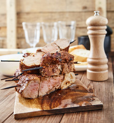 Skewered meat or shish kebabs of pork in marinade