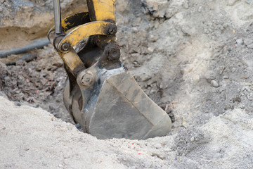 Fototapeta premium Baustelle / Baustelle und Baggerschaufel