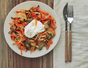 Directly above view of fried vegetables and poached egg