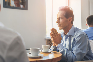 Man having coffee break in office