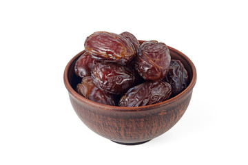 Bowl of dried dates isolated on white background