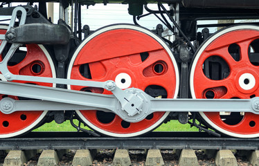 Front locomotive view. Close-up shoot of big loco wheels