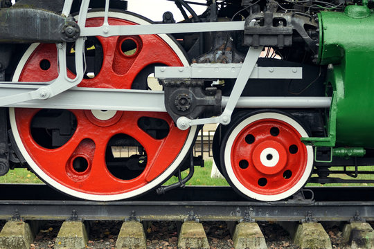 Front locomotive view. Close-up shoot of big loco wheels