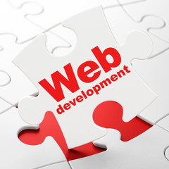 Web design concept: Web Development on puzzle background