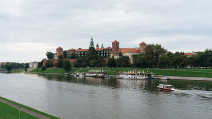 Fototapeta na wymiar Wawel Castle and Vistula river in Krakow, Poland .