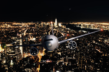 Obraz premium Airplane on night city background