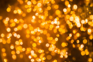 Blurry lights, out of focus.
Warm golden glow. Background use.