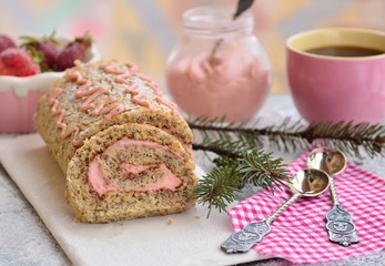 Fototapeta na wymiar banana cake roll with strawberry cream