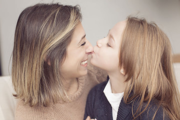 Happy mother and daughter portrait