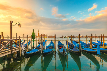 Picturesque view famous gondolas sunrise Venice Italy