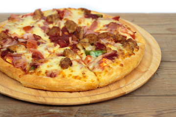 Pizza on a wooden tray.