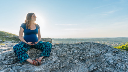 Pregnant Woman Rest in Sunset in Montains - 123951388