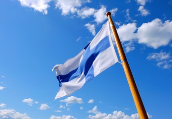 Flag of Finland on a wooden flagpole