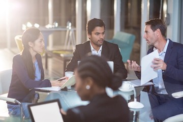 Group of businesspeople interacting with each other