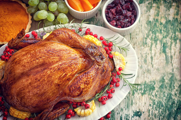 Thanksgiving Turkey dinner on old wooden table with copy space