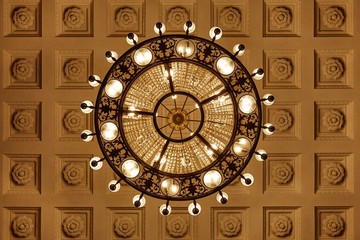 Chandelier on decoarted ceiling