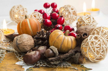 Fototapeta na wymiar Autumn pumpkins, walnuts,acorns,chestnuts and decorations