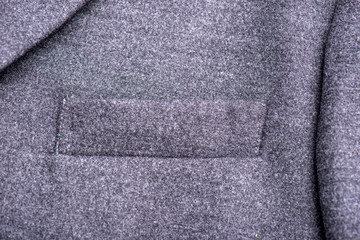 Particular pocket on the gray coat