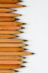 Fototapeta premium Wood made drawing pencils on white background