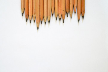 Fototapeta premium Wood made drawing pencils on white background