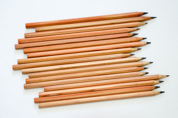Obraz premium Wood made drawing pencils on white background