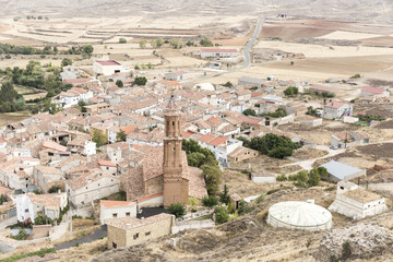 a view over Huesa del Comun town and the San Miguel church, Teruel, Spain