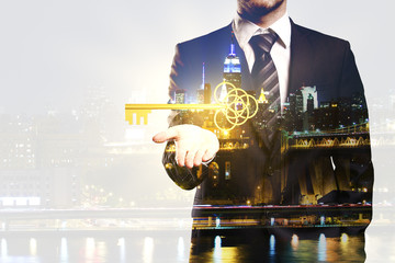 Businessman holding key