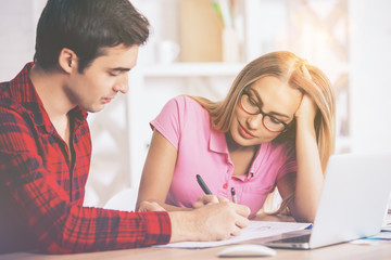 Fototapeta premium Businesspeople dealing with paperwork