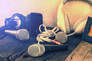 Dynamic microphone On the old wooden floor. - obrazy, fototapety, plakaty