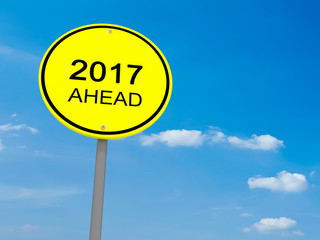 Round Yellow Road Sign 2017 Ahead Against A Cloudy Sky, 3d illustration